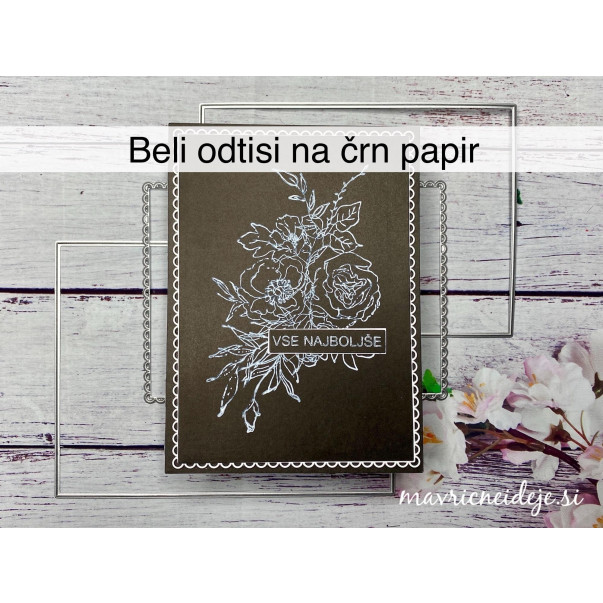 Beli odtisi na črn papir 
